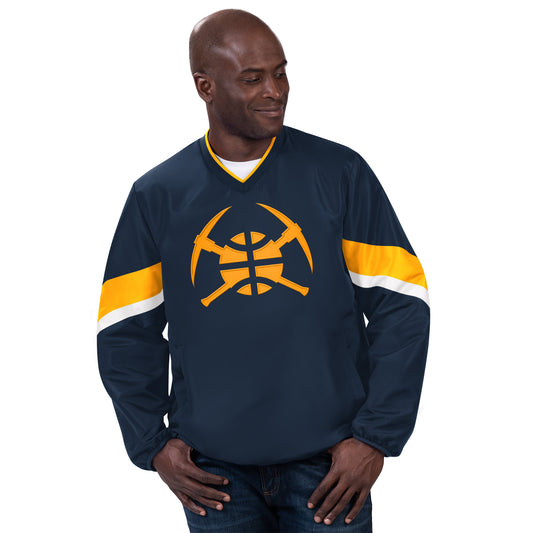 Navy blue Nuggets v-neck pullover. Yellow basketball and pickaxe logo in the middle. The sleeves have a thick yellow stripe and a thin white stripe under that around the biceps area. The v-neck has yellow trim.