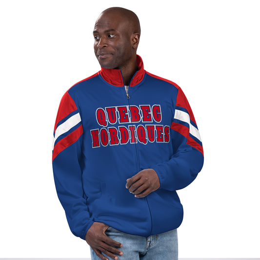 Red, white, and blue Quebec Nordiques full-zip poly jacket. The words "Quebec Nordiques" are in red letter font and run across the zipper and center of the jacket. A white and blue stripe runs across a red backdrop the upper shoulders, with blue running down the arms. Blue runs down the entire back, with a small Nordiques logo on the back neckline.