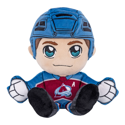 This plush toy is modeled after Colorado Avalanche defenseman Cale Makar. The figure is dressed in the Colorado Avalanche primary home jersey, which is Burgundy and Blue. He is wearing a blue helmet and gloves, and also wearing black skates. The figure has blue eyes. On the front of the Jersey it has the Avs primary logo with an "A" patch on the upper right of the logo to signify Makars alternate captaincy. On the back of the jersey it has his last name "Makar" in white lettering with his number "8".