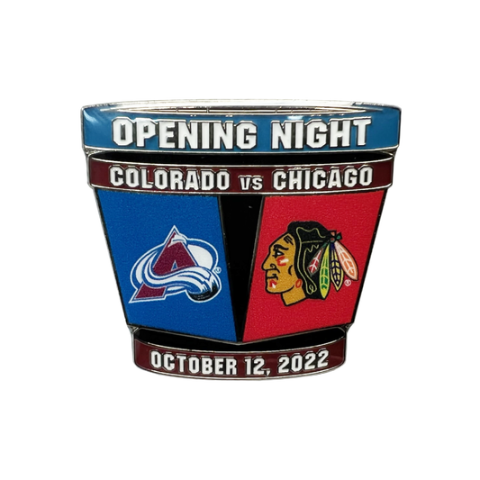 This lapel pin, is in remembrance of the Avs opening night matchup against the Chicago Blackhawks, which was also their banner raising night from their championship season the year prior. The pin is inspired by the design of the Jumbotron, with the words "Opening Night" on the top. Right below that, are the words "Colorado vs. Chicago". On the very bottom it has the date of which the game was played on "October 12. 2022". In the middle it has both the Colorado Avalanche logo and the Blackhawks logo.